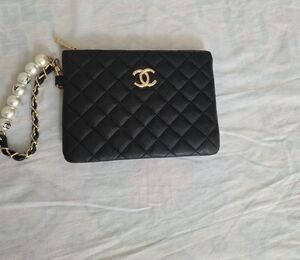 CHANEL Black Quilted Leather Wristlet with Pearl-Chain Strap